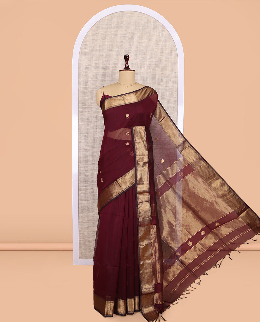 Maroon Maheshwari Cotton Saree, Elevated with Buttas, Highlighted by a Traditional Zari Border, Zari Gleamed Up Pallu, and a Matching Blouse