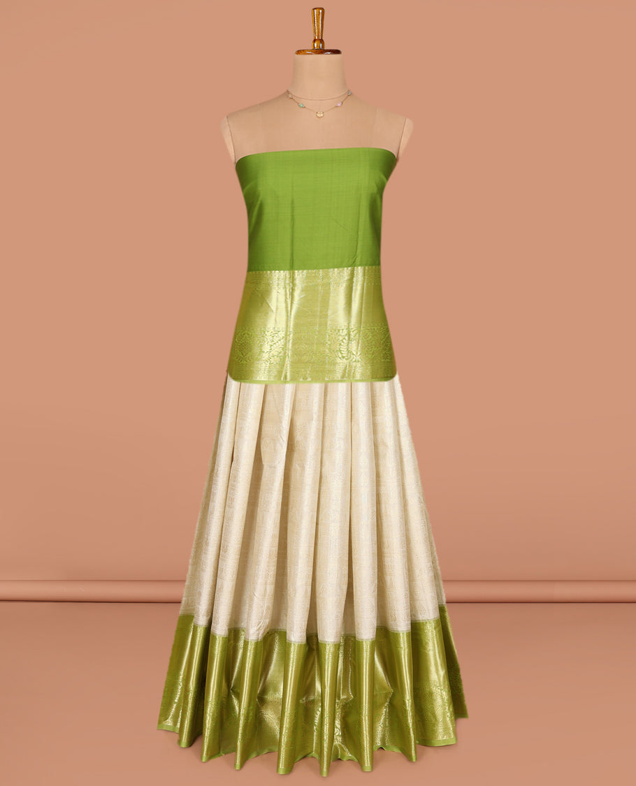 Cream Art Silk Pavadai Material Set, Subtly Sparkled with Jacquard Designs on Its Skirt, Complemented by a Contrast Traditional Zari Design Big Border, and Paired with a Contrast Blouse