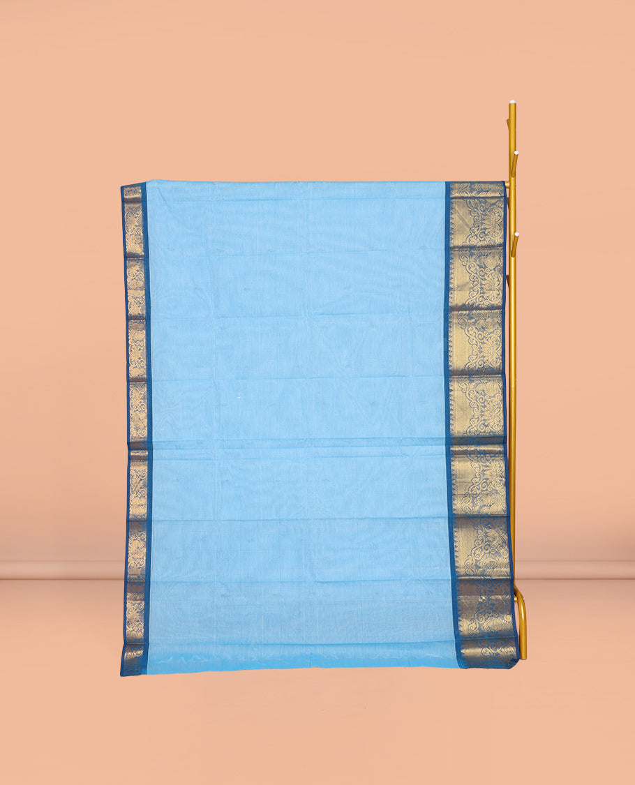 Blue Chettinad Cotton Saree, Subtly Sparkled with Buttas All Over Its Body, Complemented by a Contrast Peacock Zari Design Border, Pallu of Stripes and Buttas, and Paired with a Matching Blouse