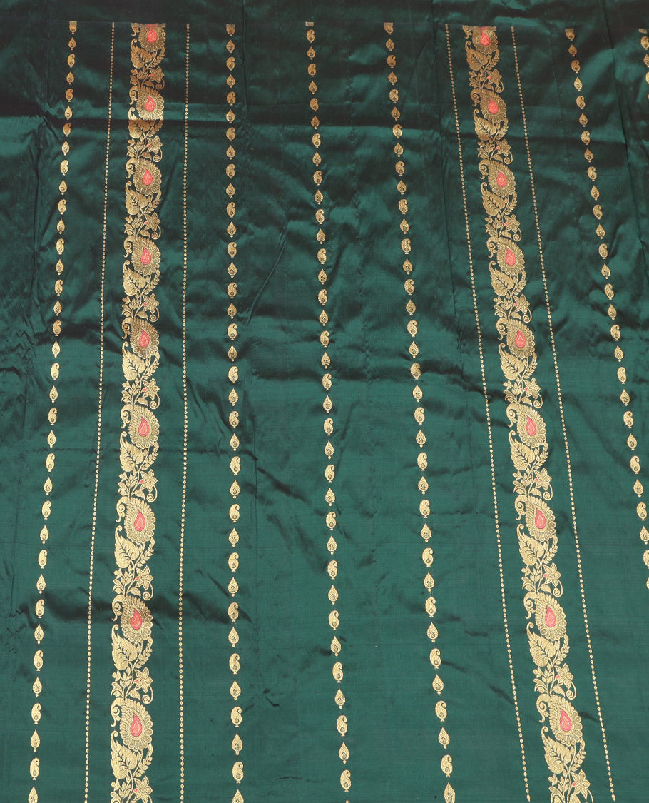 Green Pure Silk Half-Saree, Accentuated with Zari Buttas on Its Body, Complemented by a Contrast Floral and Paisley Design Border, Complemented by a Contrast Blouse, and Paired with a Contrast Dhavani of Jaal Designs