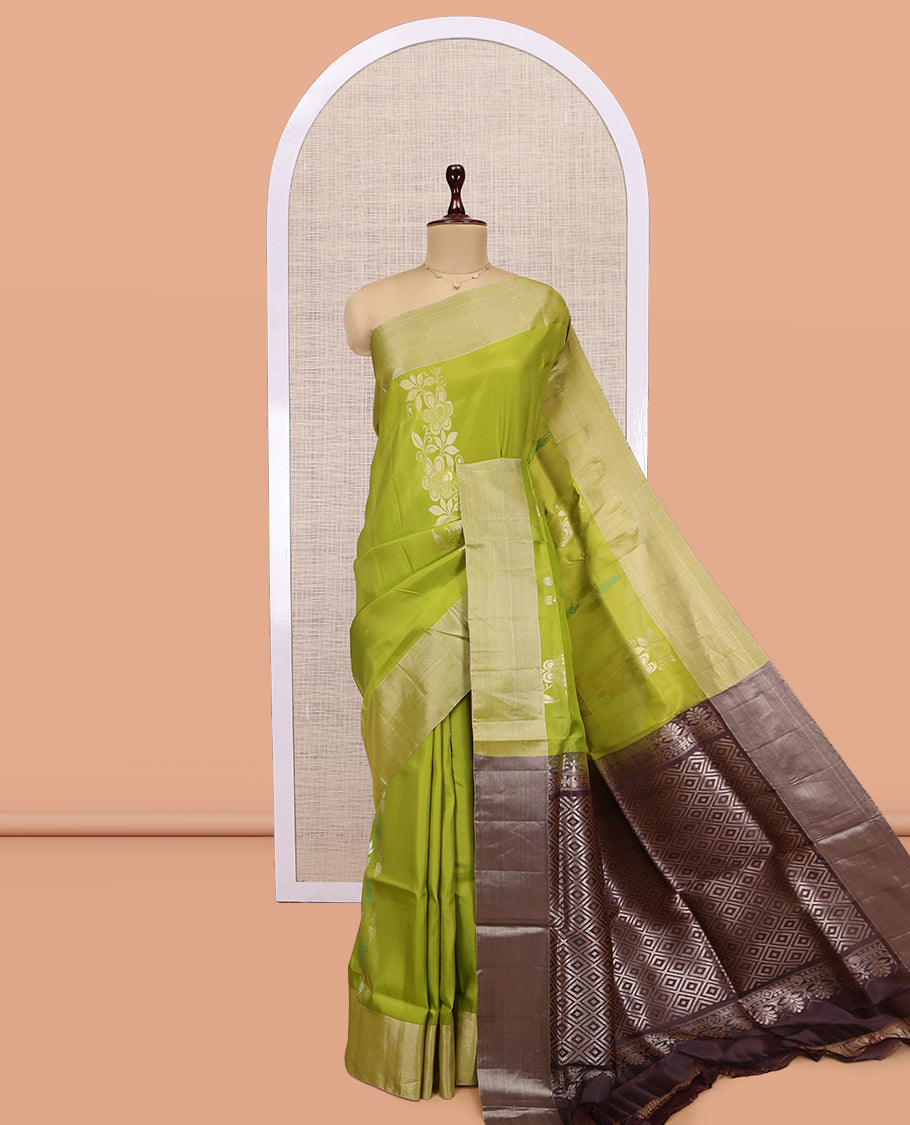 Green Uppada Saree, Elevated with Floral Zari Buttas, a Bavanji Border, Grand Jaal Pallu, and a Contrast Blouse