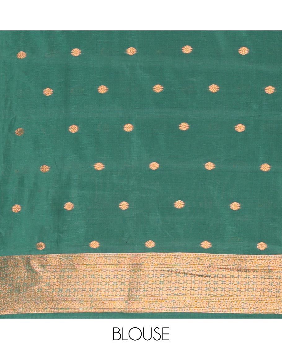 Pista Green Kanchi Silk Saree Highlighted by Thread Buttas All Over Its Body, Complemented by a Contrast Temple Border, Grandly Woven Pallu of Intricate Design Weave, and Paired with a Contrast Blouse