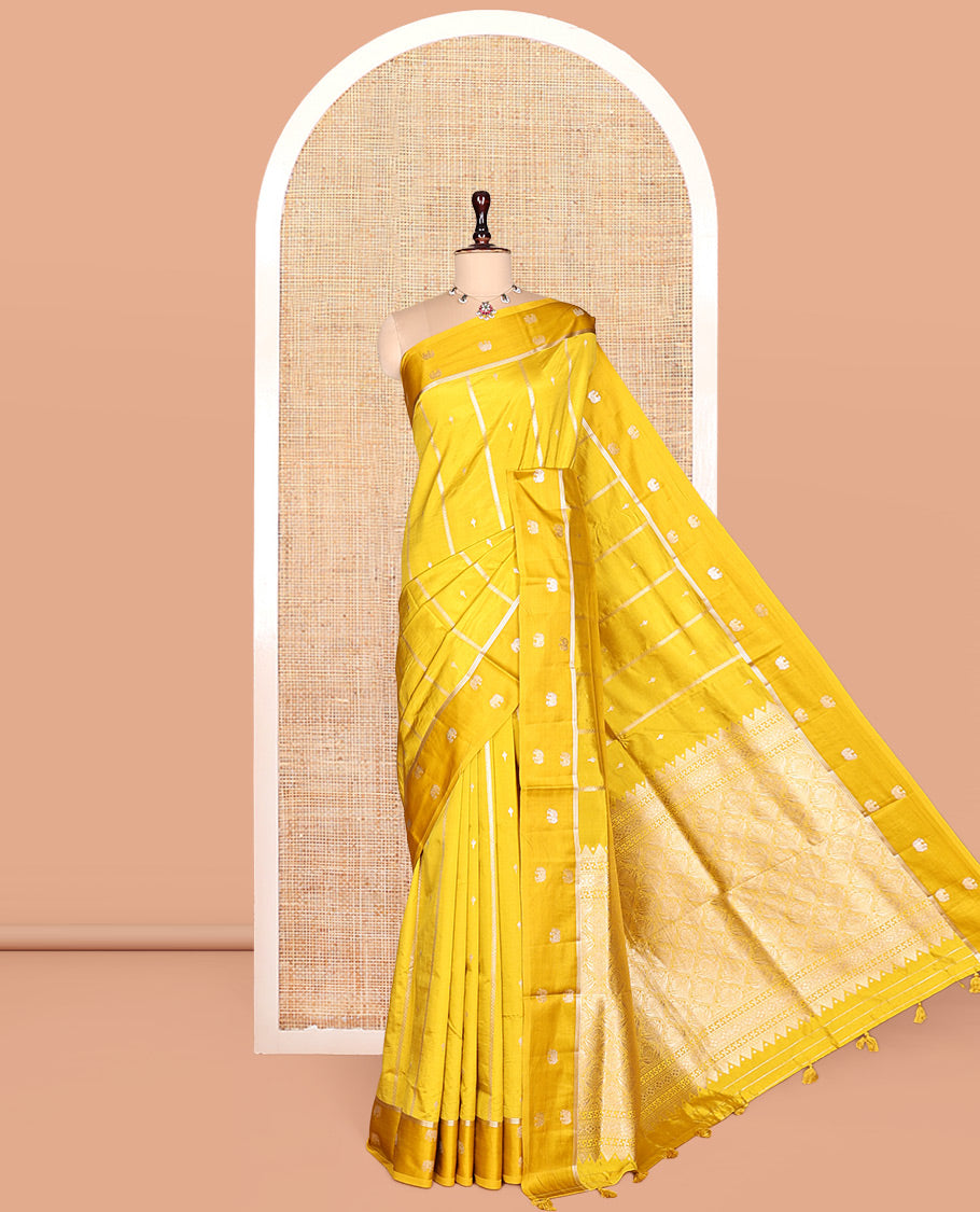 Yellow Satin Silk Saree, Gleamed Up with Buttas and Stripes, Highlighted by Elephant Motif Border, Grand Jaal Pallu, and a Matching Blouse