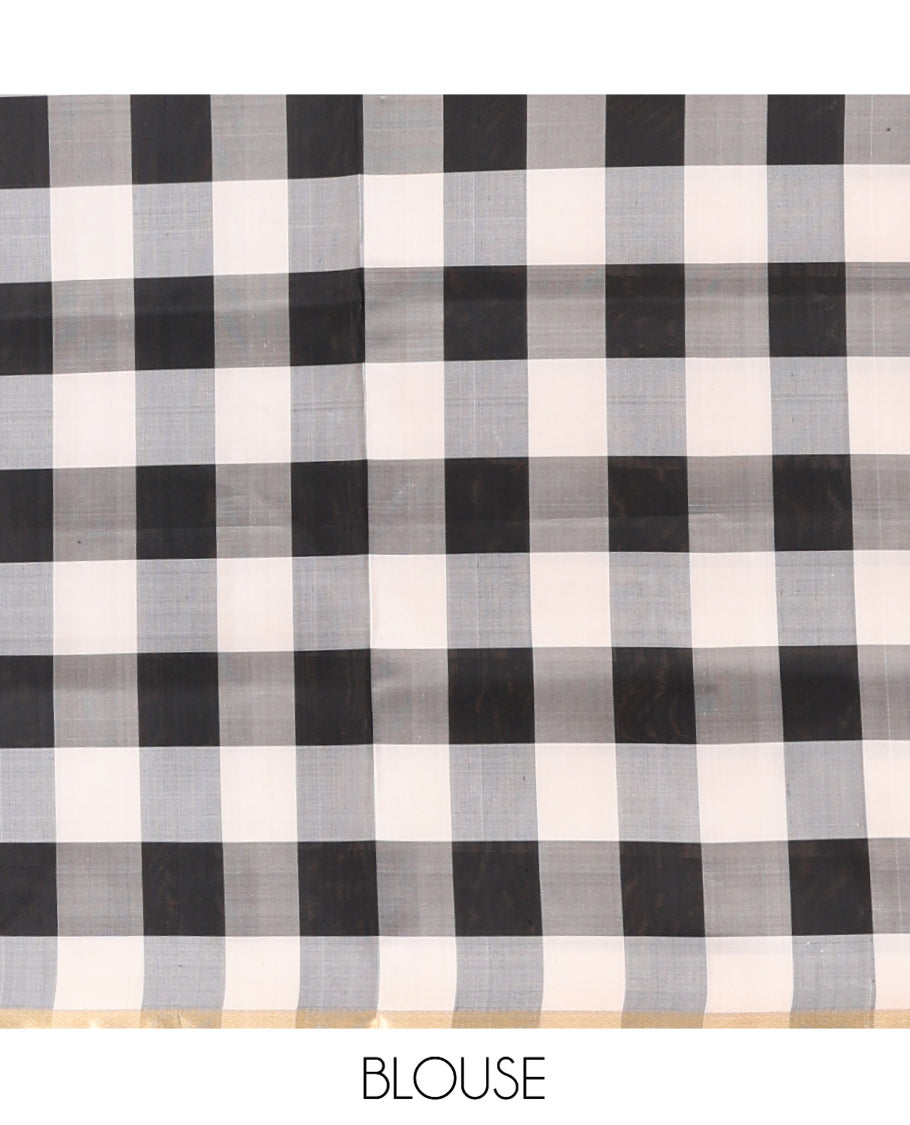 Orange Plain Mayuri Soft Silk Saree, Complemented by a Contrast Black-White Chess-Style Checked Border, Chess-Style Checked Pallu, and Paired with a Contrast Blouse