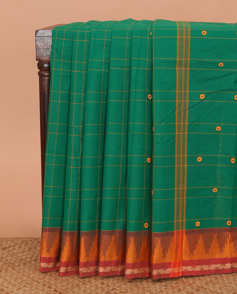 Green buttas and checked Chettinad cotton saree, contrast temple border, and pallu of buttas