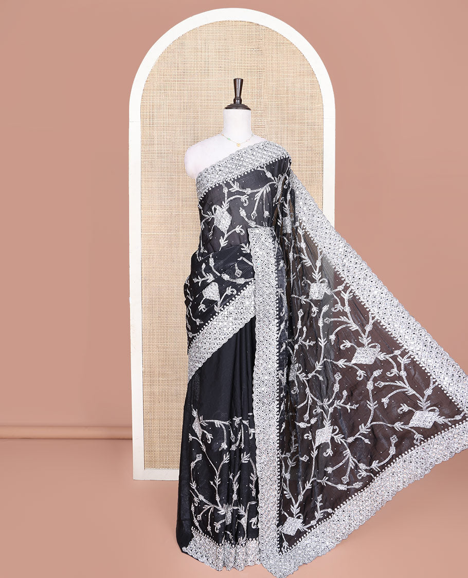 Black Designer Saree, Richly Detailed with Floral-Jaal Style Mixed Embroidery on Its Body, Highlighted by Jaal-Patterned Scallop Embroidered Border, Self-Design Pallu, and Paired with a Heavy Embroidered Matching Blouse