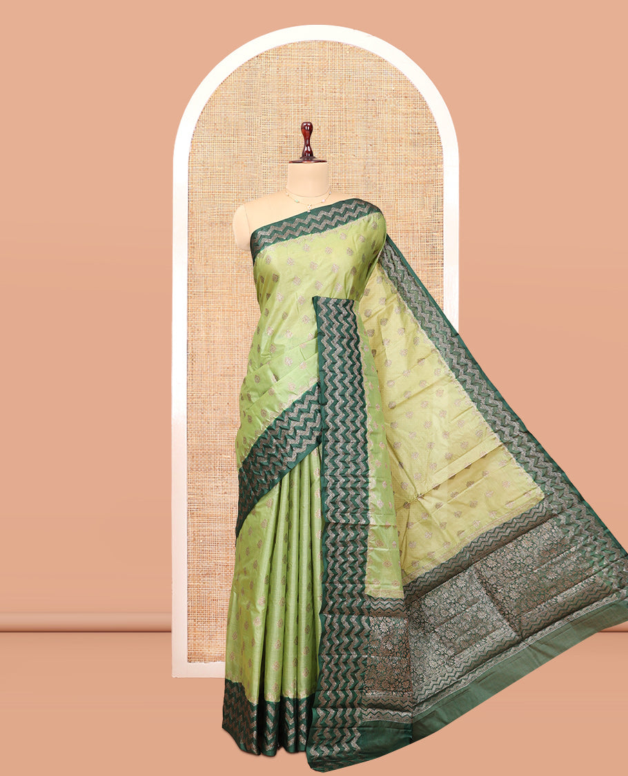 Green Tussar Silk Saree, Woven with Zari Buttas, a Contrast Chevron Zari Design Border, Floral Design Pallu, and a Contrast Blouse