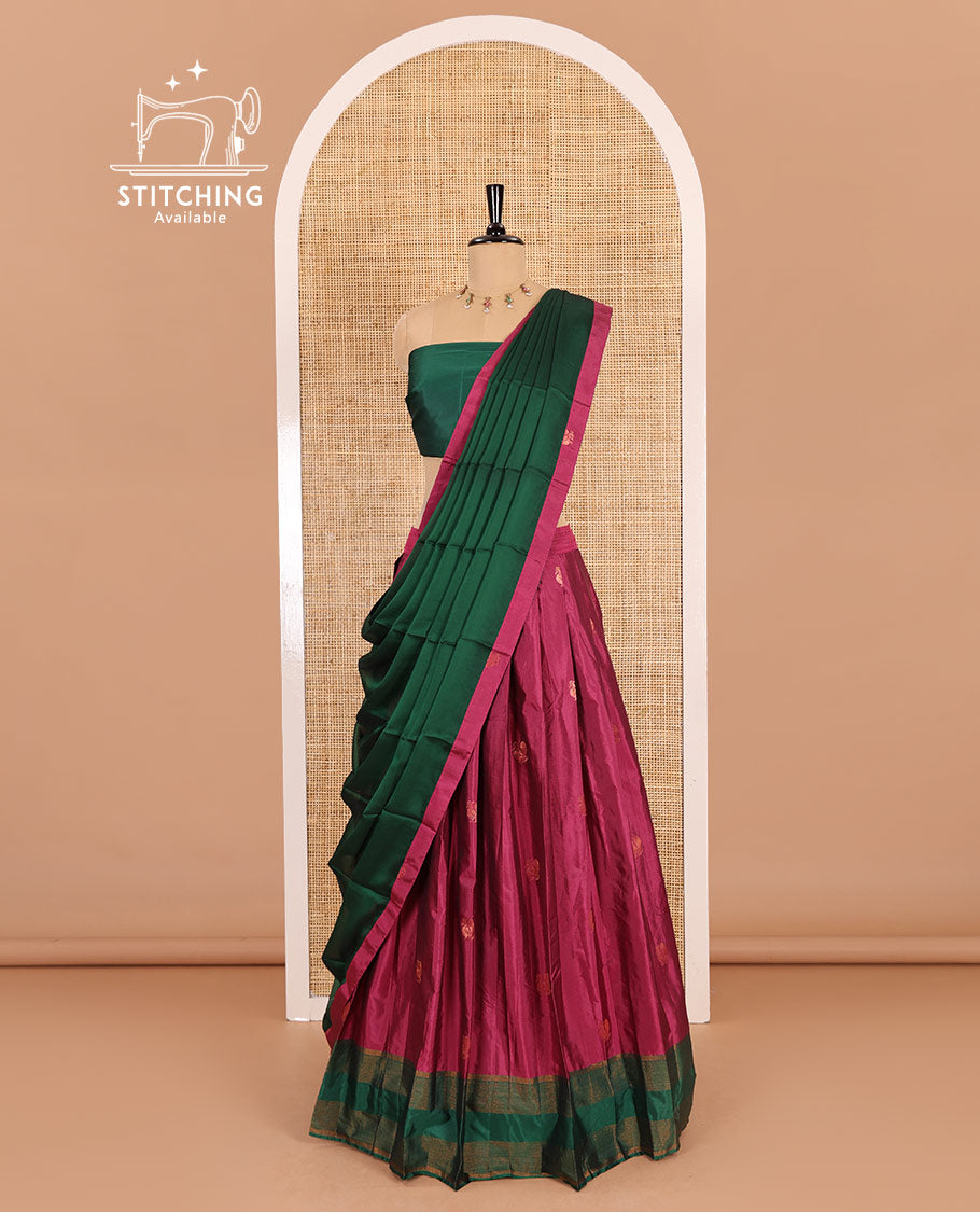 Pink and green half-saree, peacock butta with contrast bordered taffeta silk skirt, a plain blouse, and a contrast bordered syska georgette dhavani