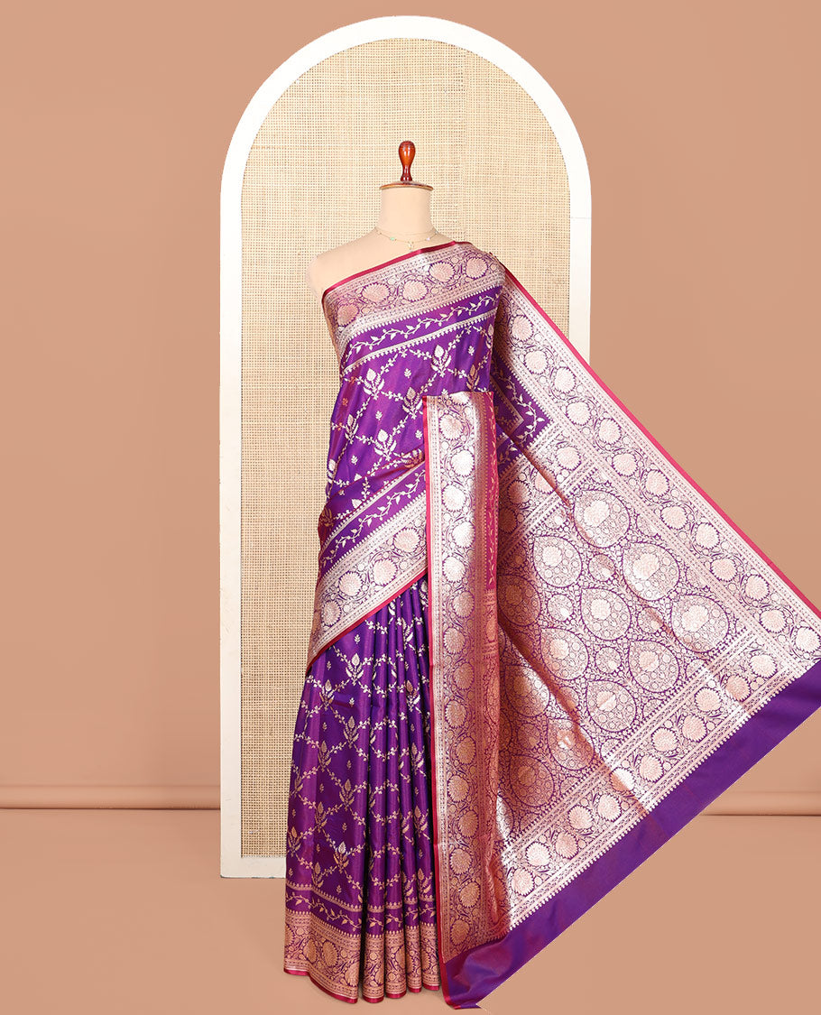 Violet Semi-Banaras Saree, Gracefully Embellished with Jaal Jacquard on Its Body, Highlighted by Floral Creeper Design Border, Intricately Designed Pallu, and Paired with a Matching Blouse