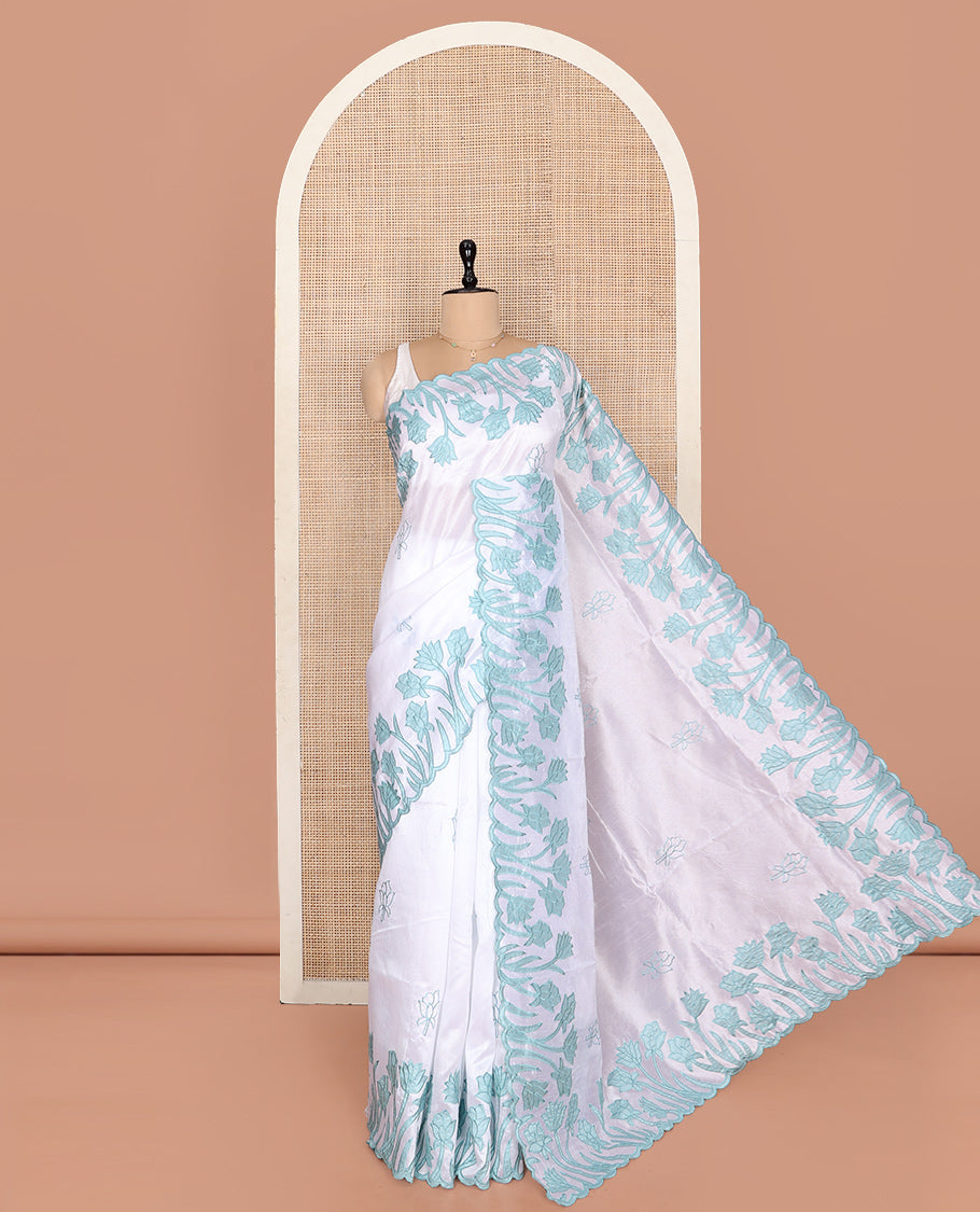 White Fancy Tussar Saree, Elegantly Highlighted with Floral Vine Embroidery, a Scallop Border, and a Matching Blouse
