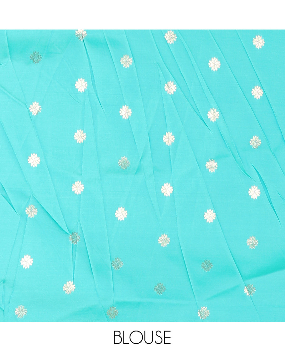 Mehendi Green Elite Soft Silk Saree, Detailed with Zari Buttas on Its Body, Complemented by a Contrast Peacock-Floral Zari Blouse, Intricately Designed Pallu, and Paired with a Contrast Blouse