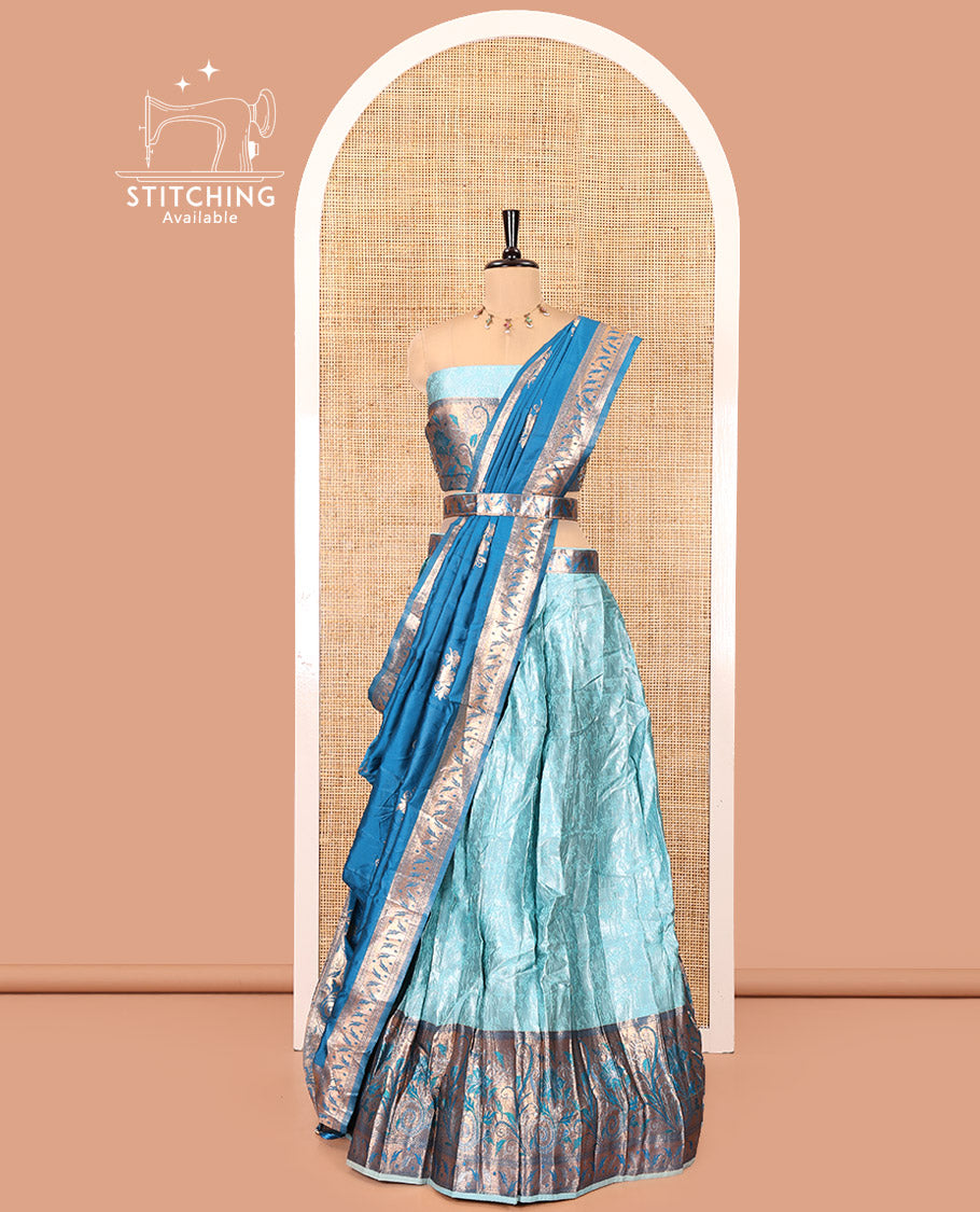 Sea Green and Peacock Green Half-Saree Set, Subtly Sparkled with Floral Vine Design on Its Banarasi Skirt, Complemented by Contrast Meenakari Floral Design with Embroidered Border, Matching Blouse, and Paired with a Banaras Dupatta