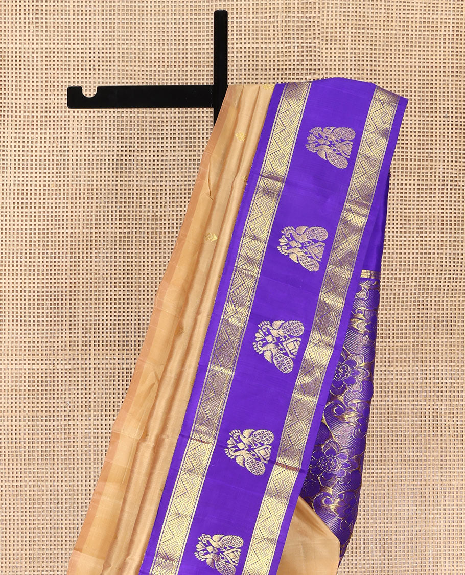 Sandal Kanchipuram Silk Saree, Highlighted with Zari Buttas on Its Body, Complemented by a Contrast One-Sided Korvai Border of Diamond and Mayil Designs, Pallu Features Floral and Paisley Designs, and Comes Without a Blouse