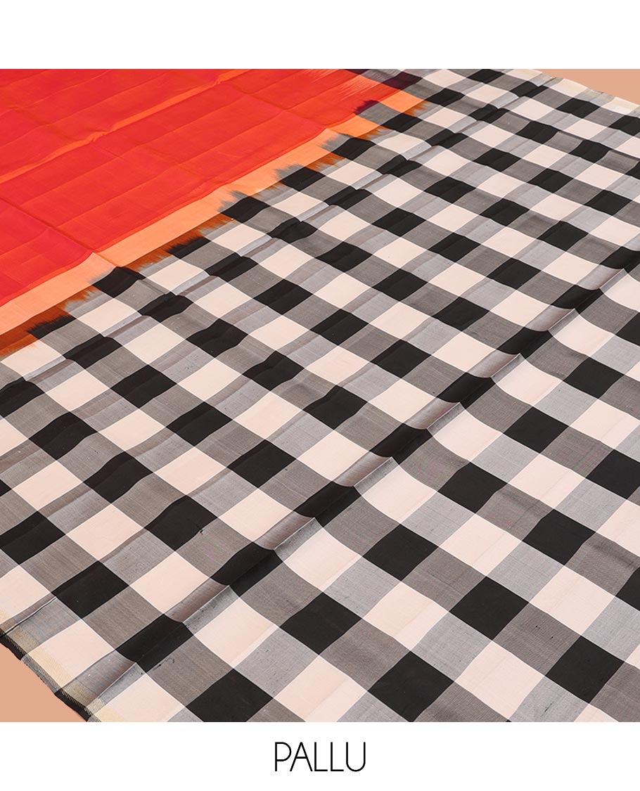 Orange Plain Mayuri Soft Silk Saree, Complemented by a Contrast Black-White Chess-Style Checked Border, Chess-Style Checked Pallu, and Paired with a Contrast Blouse