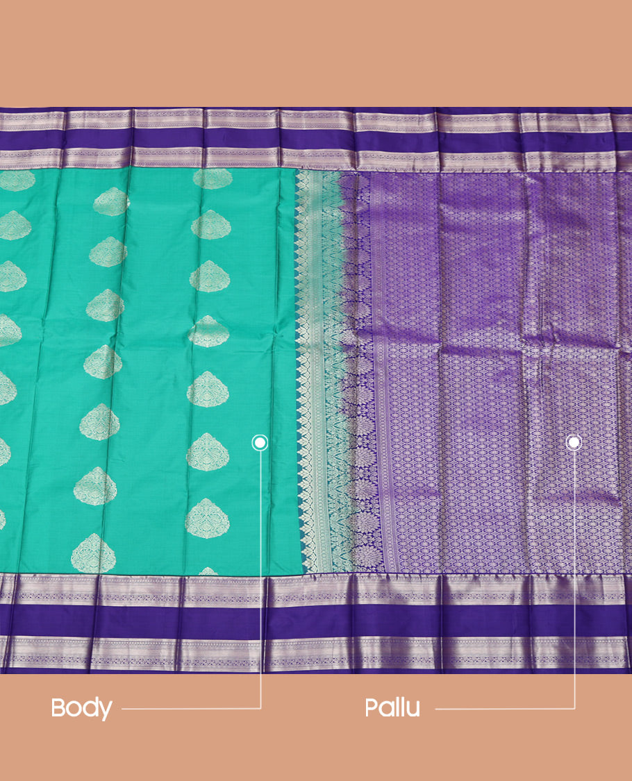 Blue Budget Silk Saree, Entralled with Zari Buttas All Over Its Body, Complemented by Contrast Traditional Zari Designs Woven Rettai Pettu Border, Grand Pallu and Paired with a Contrast Blouse