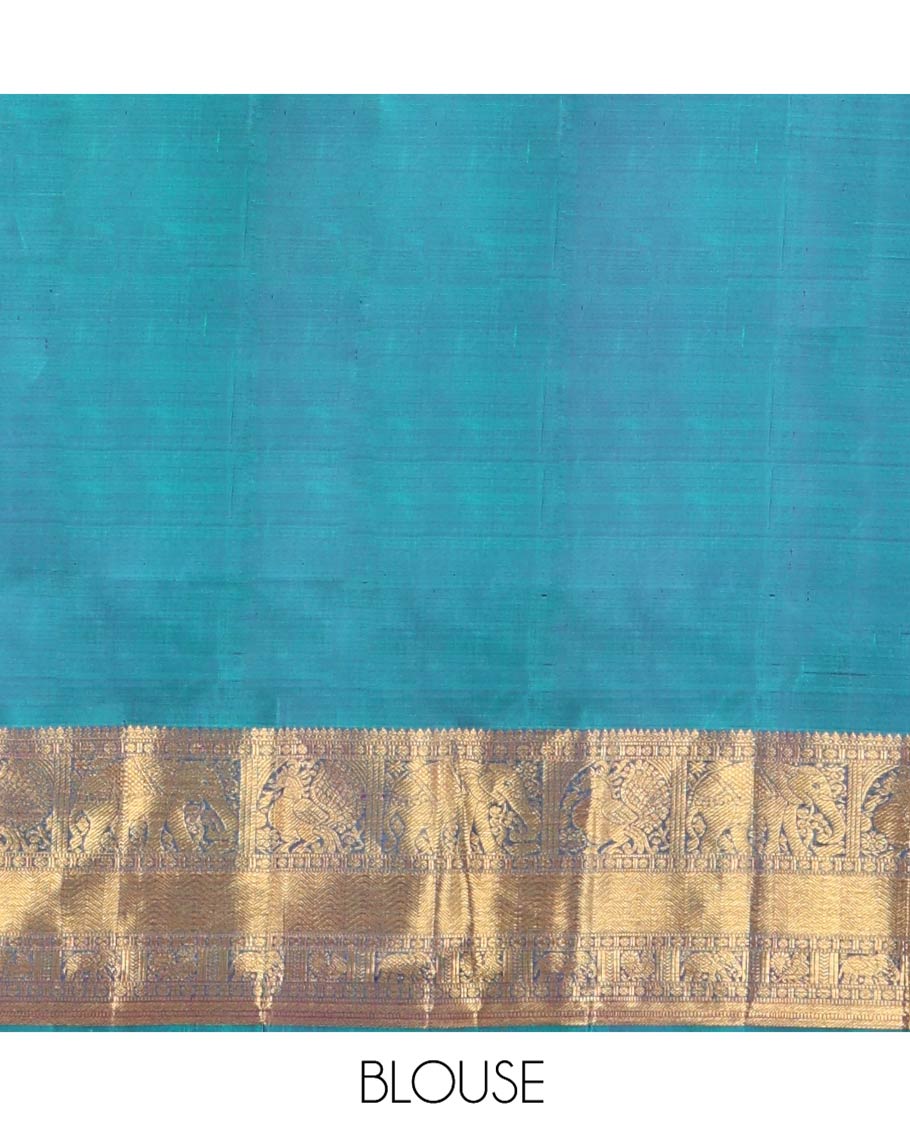 Blue Kanchipuram Wedding Silk Saree, Spotlighted with Jacquard Design Weave, Highlighted by Zari Border of Thilakam Mokku, Muthu, Banaras, Rudraksham, Mayil, Yaanai, and Vanki Designs, Grand Jaal Pallu, and Paired with a Matching Blouse