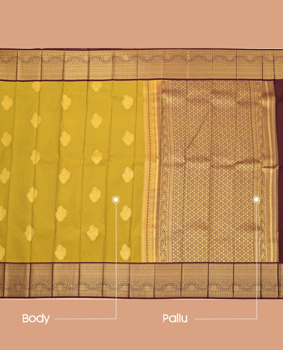 Green Budget Silk Saree, Gleamed Up with Zari Buttas All Over Its Body, Complemented by a Contrast Border of Traditional Motifs in Zari, Pallu Woven with Jaal Design, and Paired with a Contrast Blouse