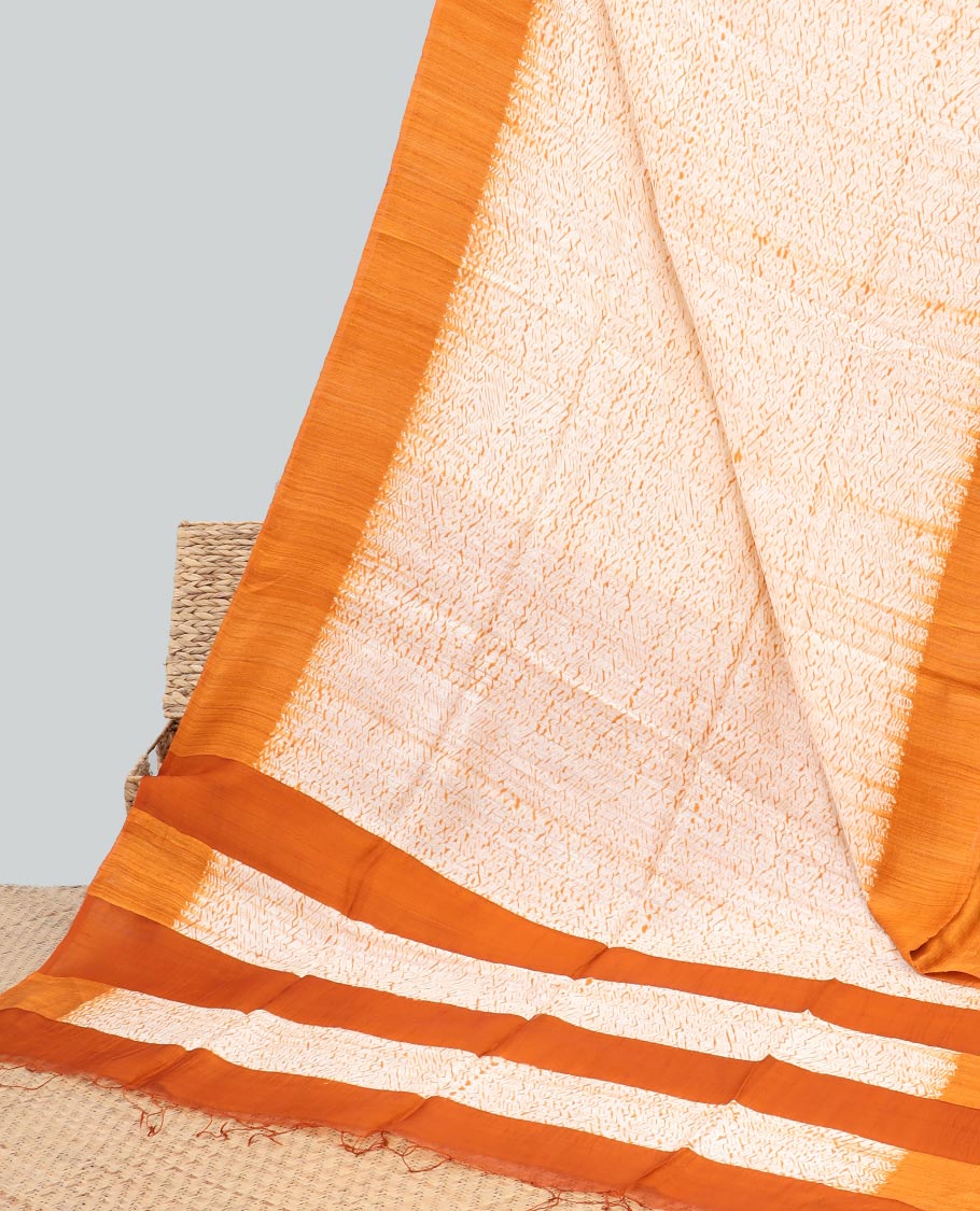 Cream abstract design matka silk saree with contrast plain border & orange abstract design pallu