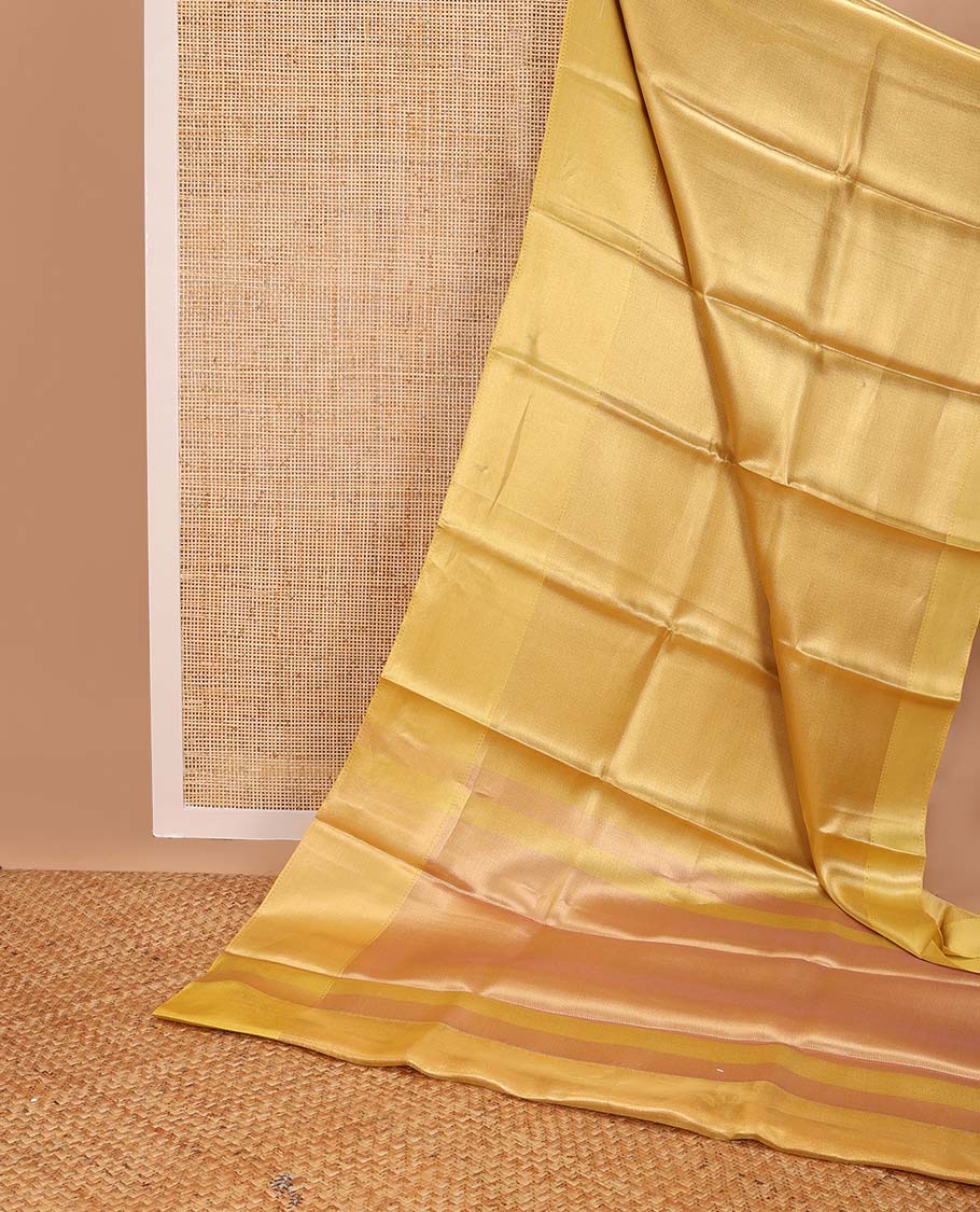Yellow chevron design tissue saree with contrast striped border & zari design pallu