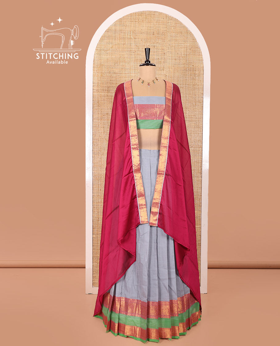 Grey and Rani Chettinad Cotton Half-Saree Featuring Plain Skirt, Adorned with a Contrast Traditional Zari Design Rettai Pettu Border of Peacock Designs, Paired with a Matching Blouse, and Contrast Satin Georgette Dhavani with Zari Border