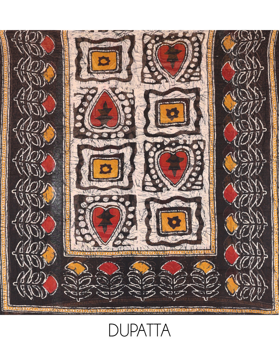 Black-Yellow Cotton Material Chudidar Features Batik-Printed Top, a Contrast-Printed Bottom, Batik-Printed Dupatta