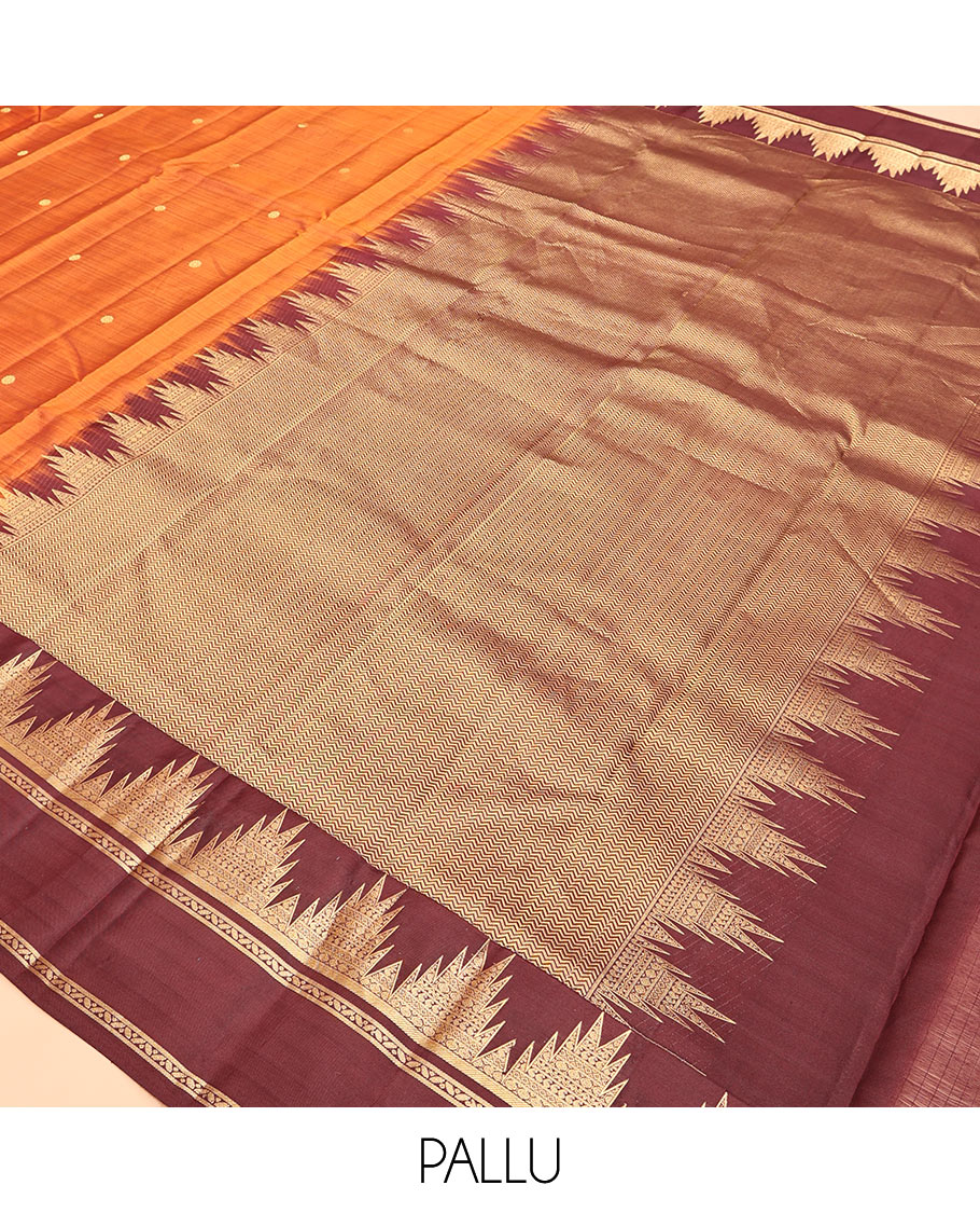 Orange Vasundhara Silk Saree, Delicately Woven with Zari Buttas, Complemented by a Contrast Rettai Pettu Border of Thazampoo Rekku Designs, Vanki Pallu, and a Contrast Blouse