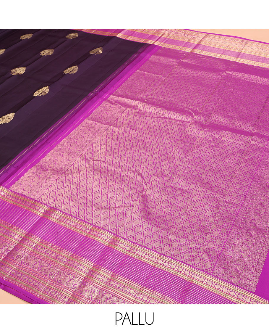 Eggplant Purple Kanchipuram Silk Saree, Adorned with Zari Buttas on Its Body, Complemented by a Contrast Border of Rekku, Neli, Paisa, Muthu, Banaras, Kuthirai, and Yaanai Designs, Grand Jaal Pallu, and Paired with a Contrast Blouse
