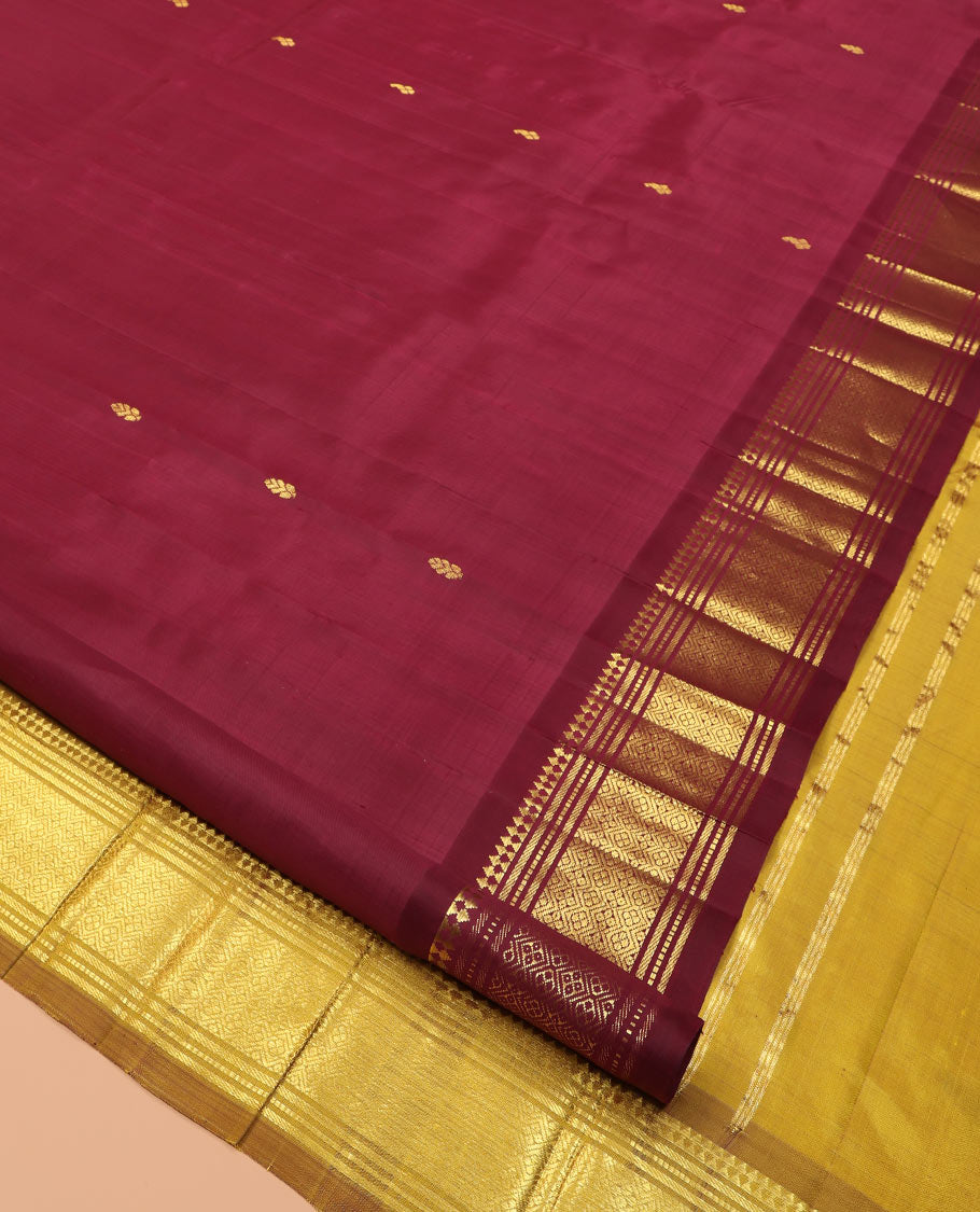 Maroon Kanchipuram Silk Saree, Graced with Zari Buttas, Highlighted by a One-Sided Zari Border of Panner Sombu, Banaras, Muthu, and Jaal Designs, Contrast Grand Pallu, and a No Blouse