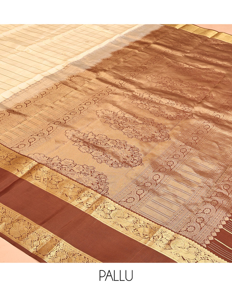 Cream Vasundhara Silk Saree, Enthralled with Zari Buttas Enclosed Checks All Over Its Body, Complemented by a Contrast Rettai Pettu Border of Muthu, Banaras, and Iruthalai Pakshi Designs, a Grand Pallu, and Paired with a Contrast Blouse