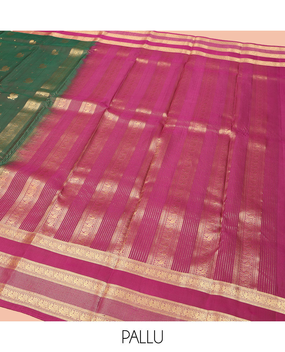 Green Vasundhara Lite Silk Mix Saree, Graced with Mayil Buttas All Over Its Body, Complemented by a Contrast Border of Neli, Muthu, and Chakram Designs, Pallu Steeped with Traditional Designs, and Paired with a Contrast Blouse