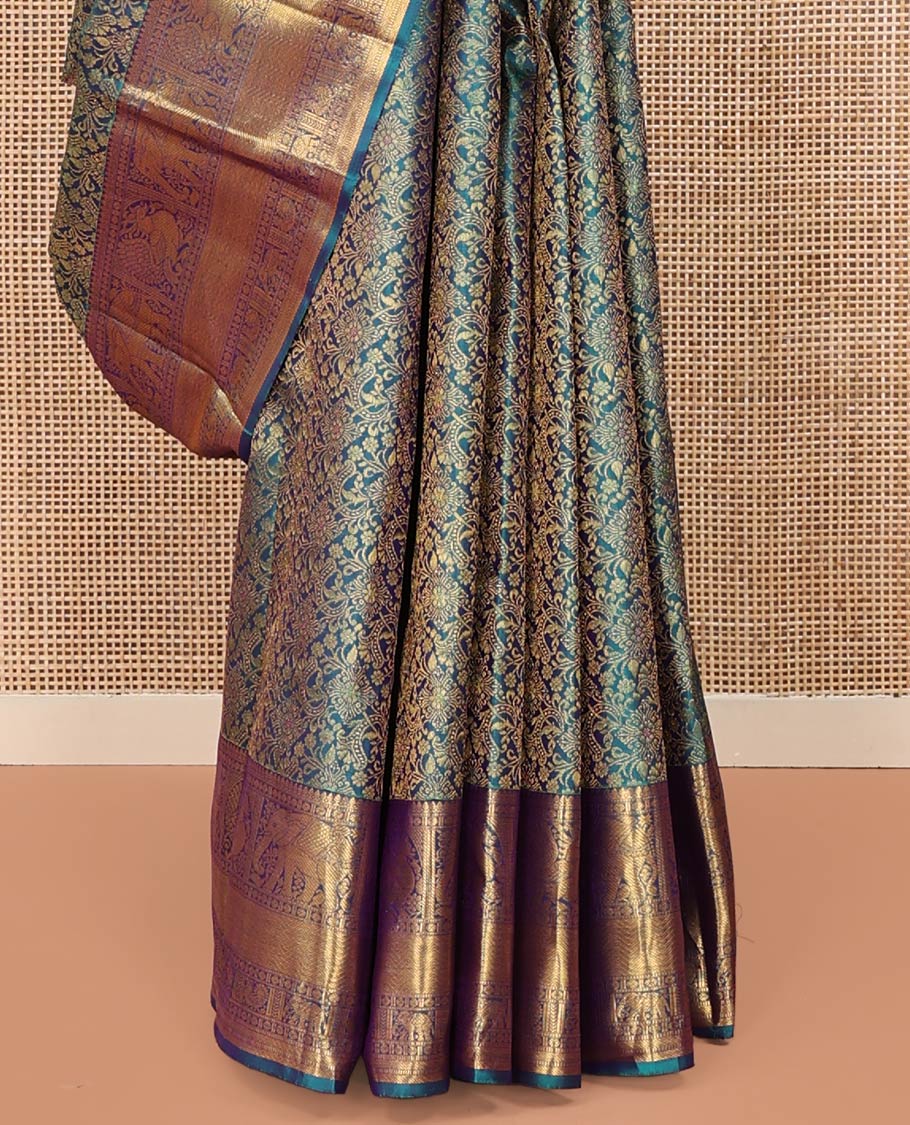 Blue Kanchipuram Wedding Silk Saree, Spotlighted with Jacquard Design Weave, Highlighted by Zari Border of Thilakam Mokku, Muthu, Banaras, Rudraksham, Mayil, Yaanai, and Vanki Designs, Grand Jaal Pallu, and Paired with a Matching Blouse