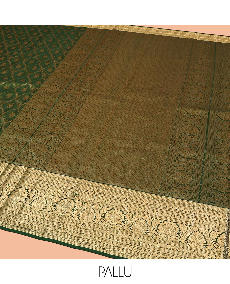 Green Kanchipuram Wedding Silk Saree, Elevated with Jacquard Designs on Its Body, Highlighted by a Traditional Zari Border of Kuthirai, Chakram, and Mayil Designs, Pallu of Greek Key Designs, and Paired with a Matching Blouse