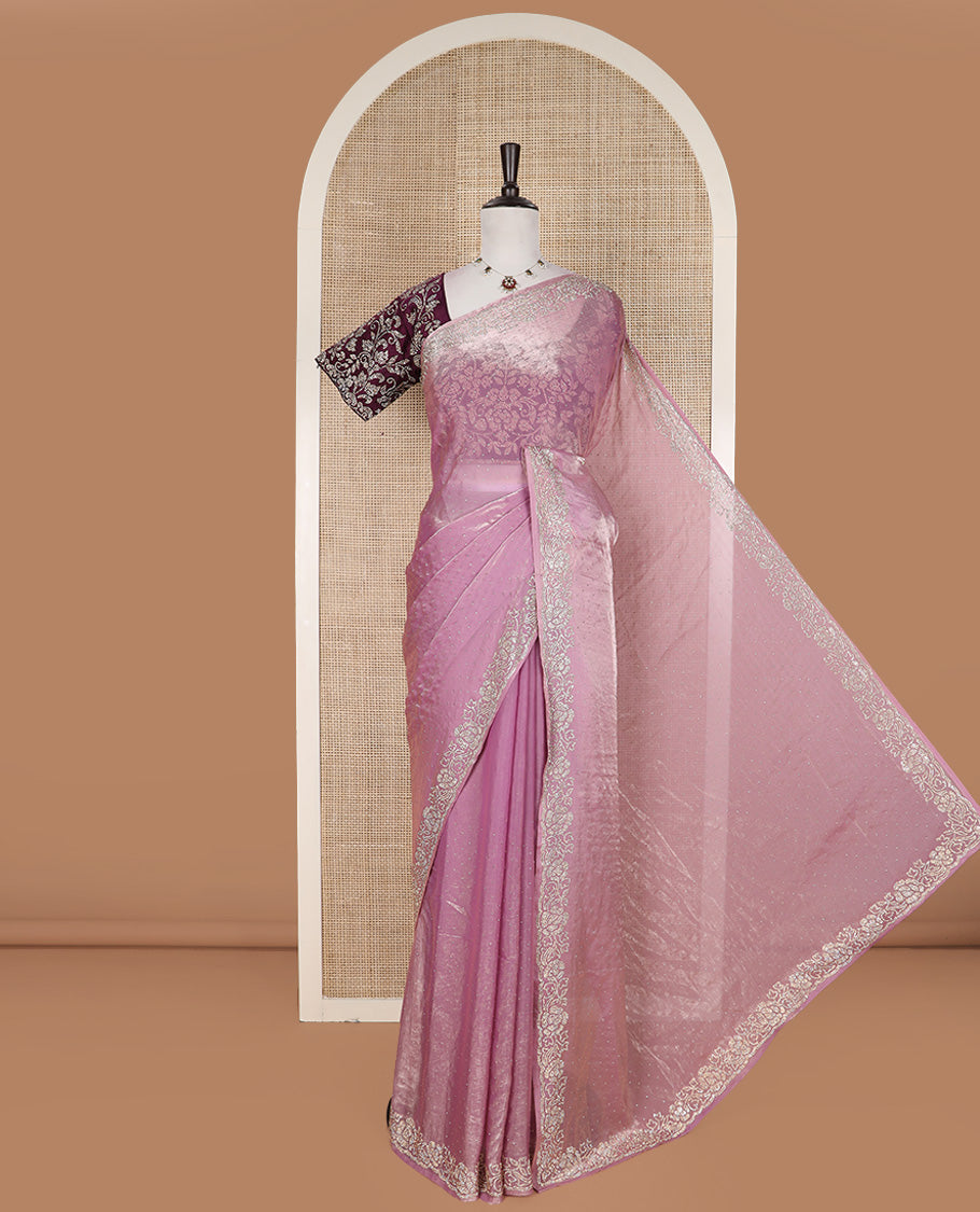 Pink stone work designer saree, micro-stone work border, and a contrast half-sleeve blouse of floral vine design in micro stones