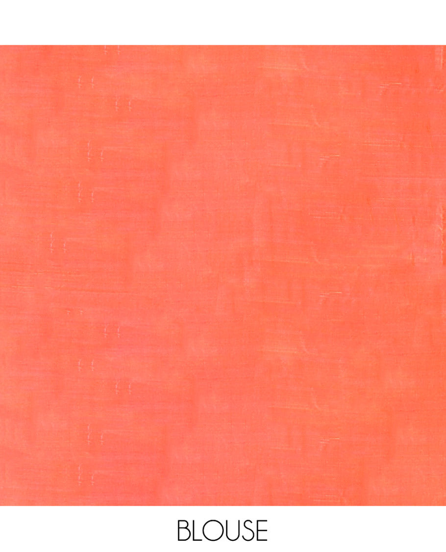 Orange Kanchipuram Silk Saree, Subtly Sparkled with Zari Buttas on Its Body, Complemented by a Contrast Border of Manga Designs, Pallu Steeped with Floral Designs, and Paired with a Contrast Blouse