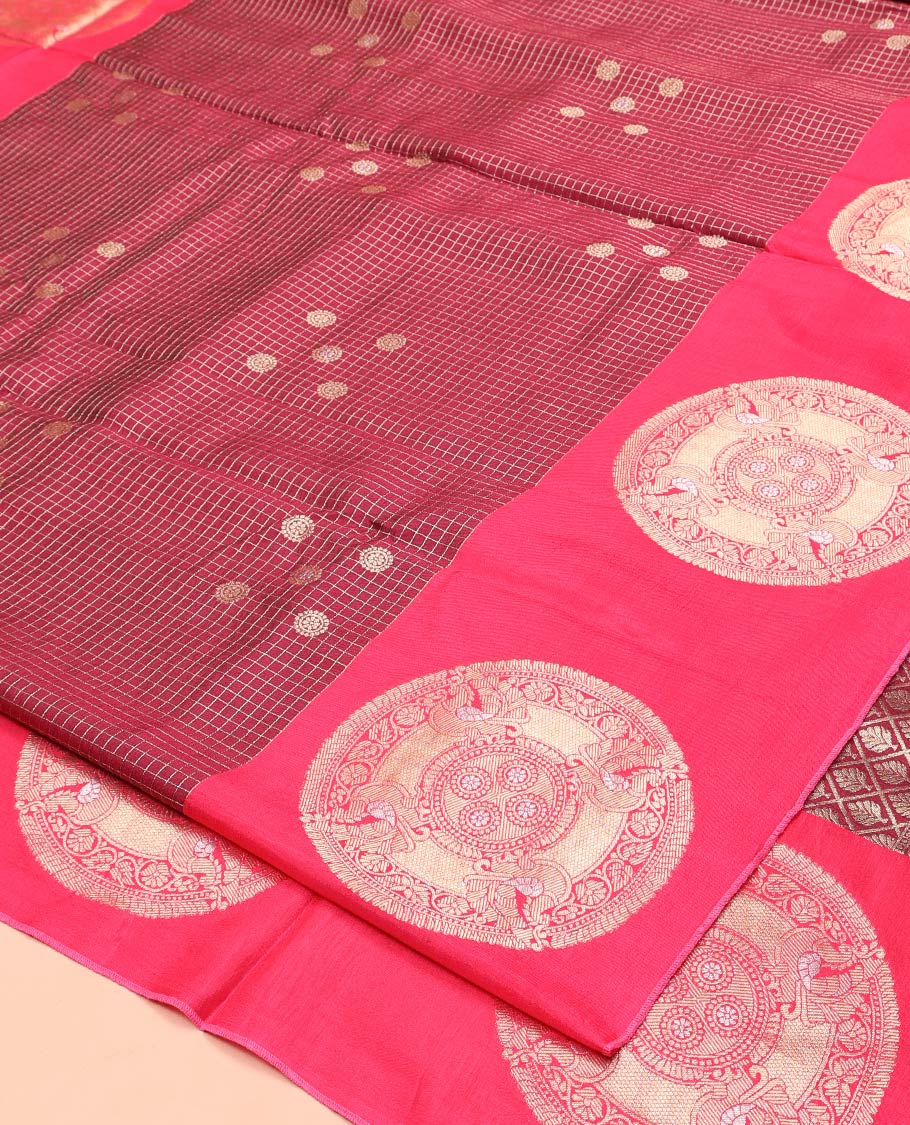 Maroon H O-Silk Saree, Elegantly Detailed with Zari Buttas and Zari Checks On Its Body, Accentuated with Contrast Big Chakram Motifs Woven Border, Grand Jaal Design Woven Pallu, and Paired with a Checked Blouse