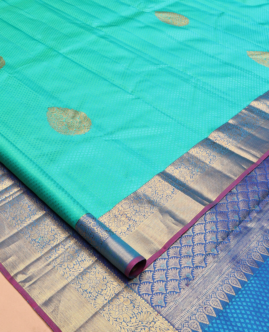 Blue Embossed Parambara Silk Saree, Elevated with Zari Buttas, a Contrast Border of Kodi Visiry Designs, Pallu of Scallop Design, and Contrast Blouse