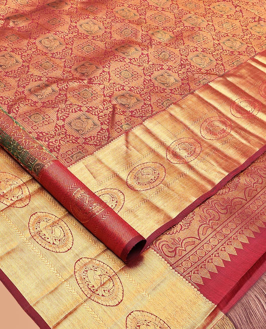 Maroon Kanchipuram Wedding Silk Saree, Decorated with Jacquard Design, Zari Border of Poo Chakram Designs, Grand Pallu, and a Matching Blouse