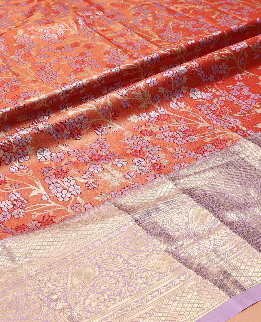 Orange Art Silk Material Half Saree Set, Accentuated with Floral Jacquard Design Skirt, a Contrast Traditional Zari Design Border, Contrast Zari-Jacquard Blouse, and a Dhavani of Paisley Designs