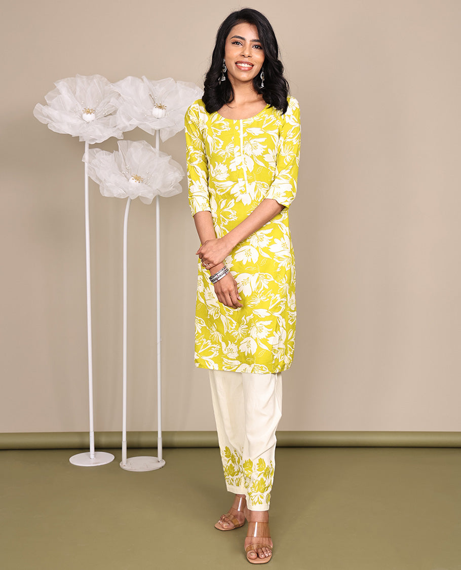 Green Cotton Ready-Made Suit, Featuring Silhouette-Style Floral Prints, a Round Neckline, 3/4 Sleeves, and Straight-Cut Top, Paired with Floral-Printed Straight-Cut Pants