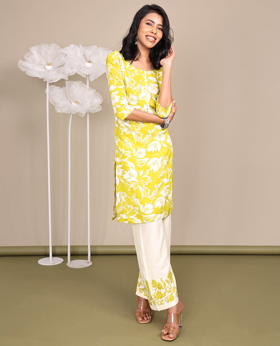 Green Cotton Ready-Made Suit, Featuring Silhouette-Style Floral Prints, a Round Neckline, 3/4 Sleeves, and Straight-Cut Top, Paired with Floral-Printed Straight-Cut Pants