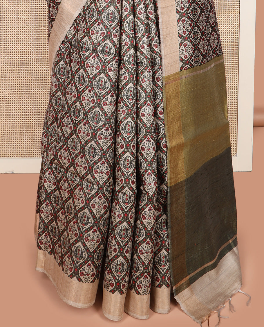 Green ogee patterned tussar silk saree, contrast bavanji border, and double-color plain pallu