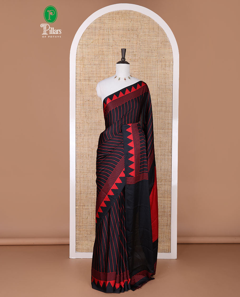 Black with red vertical lining printed design semi modal crepe saree with temple border & circle butta pallu along with printed blouse