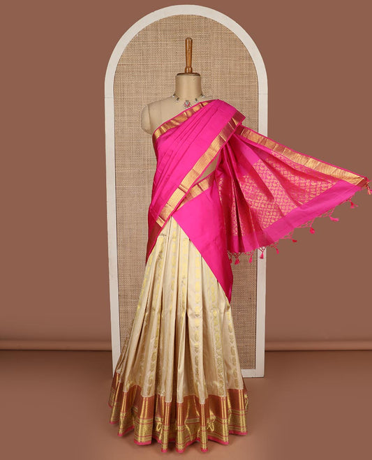 Cream pure silk half saree, zari design skirt, contrast border, and blouse of mayil kann, kodi visiry and mayil design, and intricate dhavani