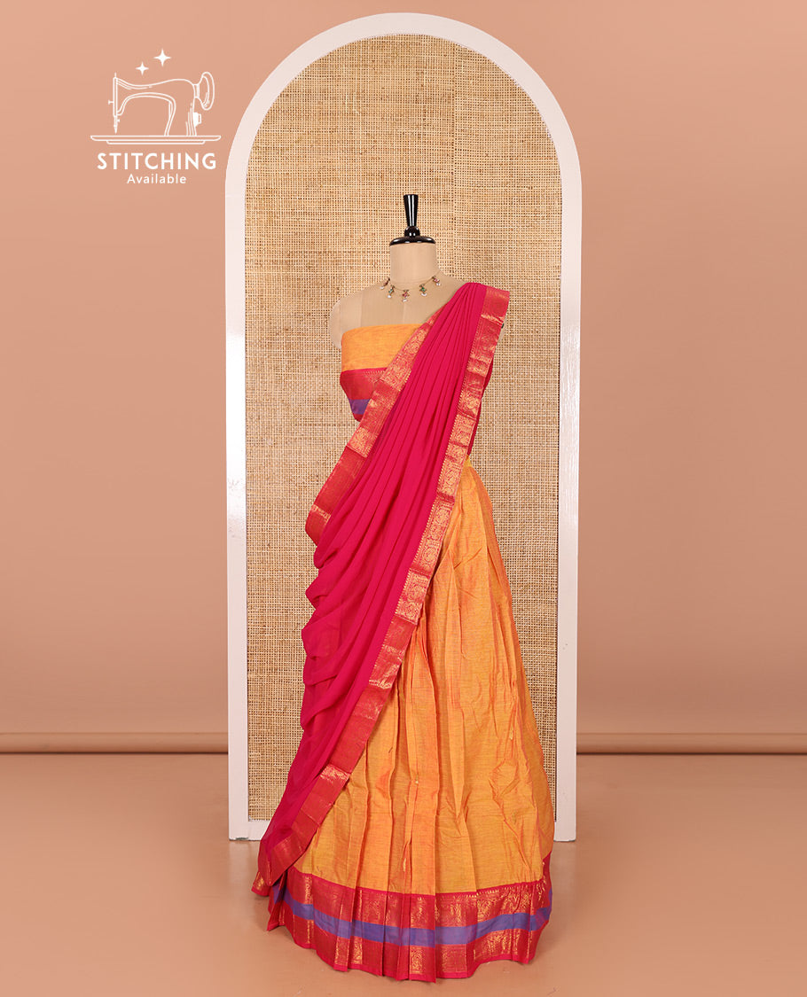 Mustard and Rani Pink Chettinad Cotton Half-Saree Featuring Buttas Woven Skirt, Highlighted with a Contrast Rettai Pettu Peacock Motifs Woven Zari Border, a Subtly Woven Matching Blouse, and a Vichitra Silk Contrast Traditional Zari-Bordered Dhavani