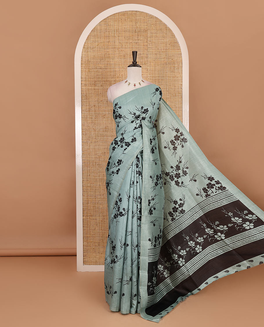 Borderless green five petal floral motifs printed semi tussar saree, self-pallu of floral print, and printed blouse
