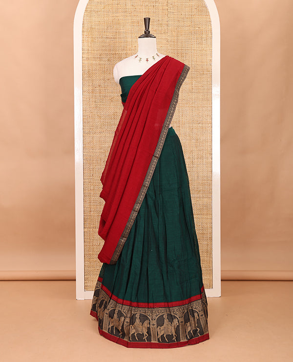 Green with maroon mercedised cotton half-saree, contrast elephant zari border skirt, matching blouse & one side border georgette dhavani