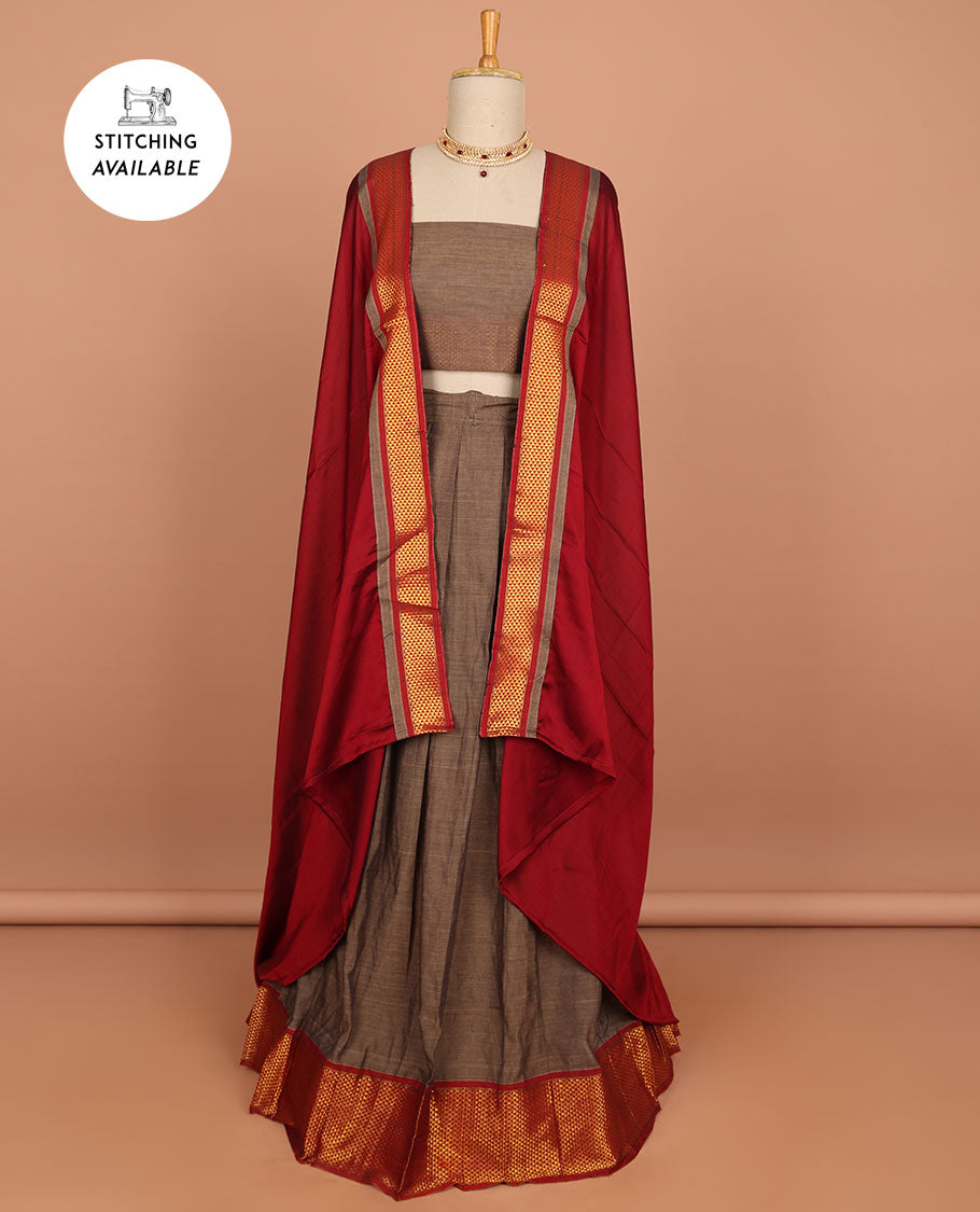 Pink cotton half saree with contrast traditional border , plain blouse & plain dhavani with zari design border