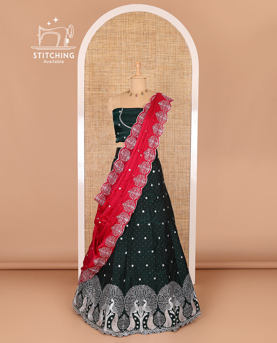 Dark green half-saree, buttas, tree, and peacock motifs embroidered semi-taffeta silk top, matching blouse, and contrast scallop embroidered dhavani
