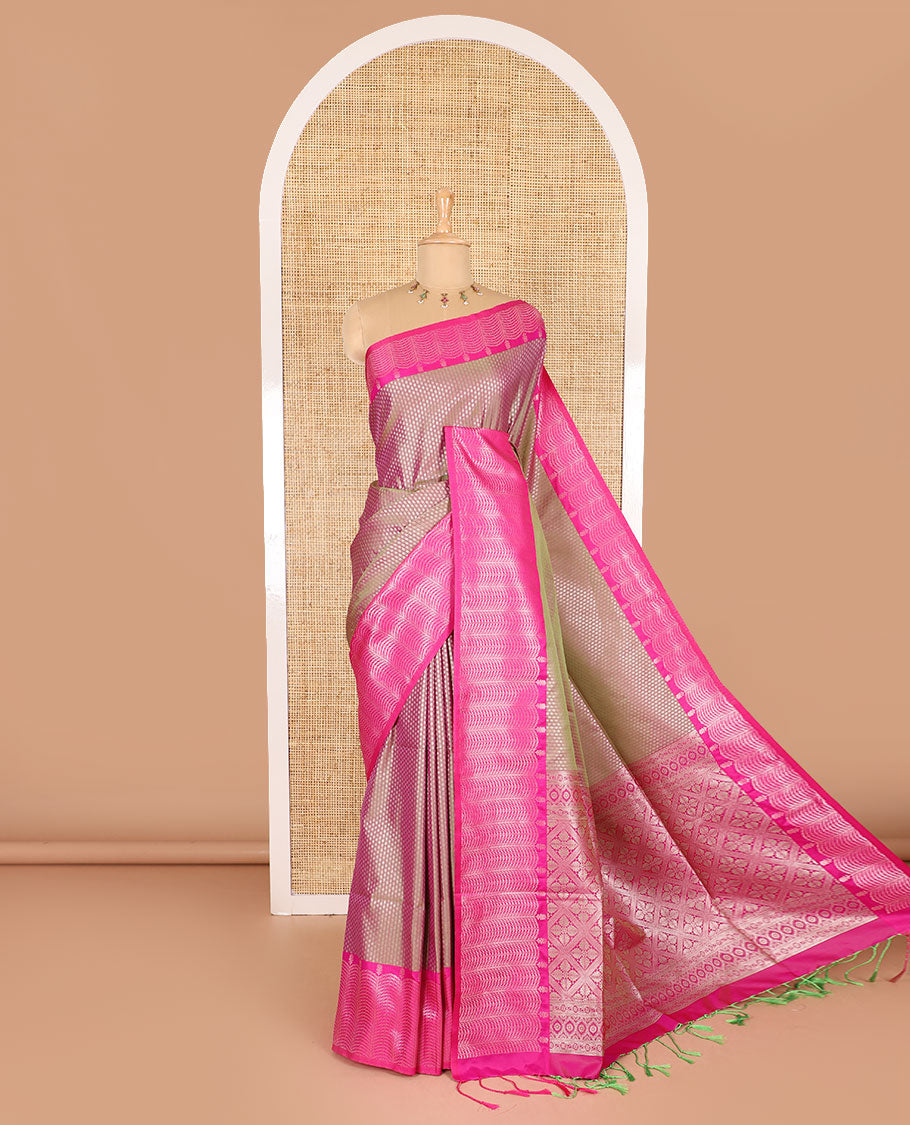 Sage green small zari buttas woven elite soft silk saree, contrast zari woven scallop satin border, jaal pallu, and a contrast chakram zari motifs blouse