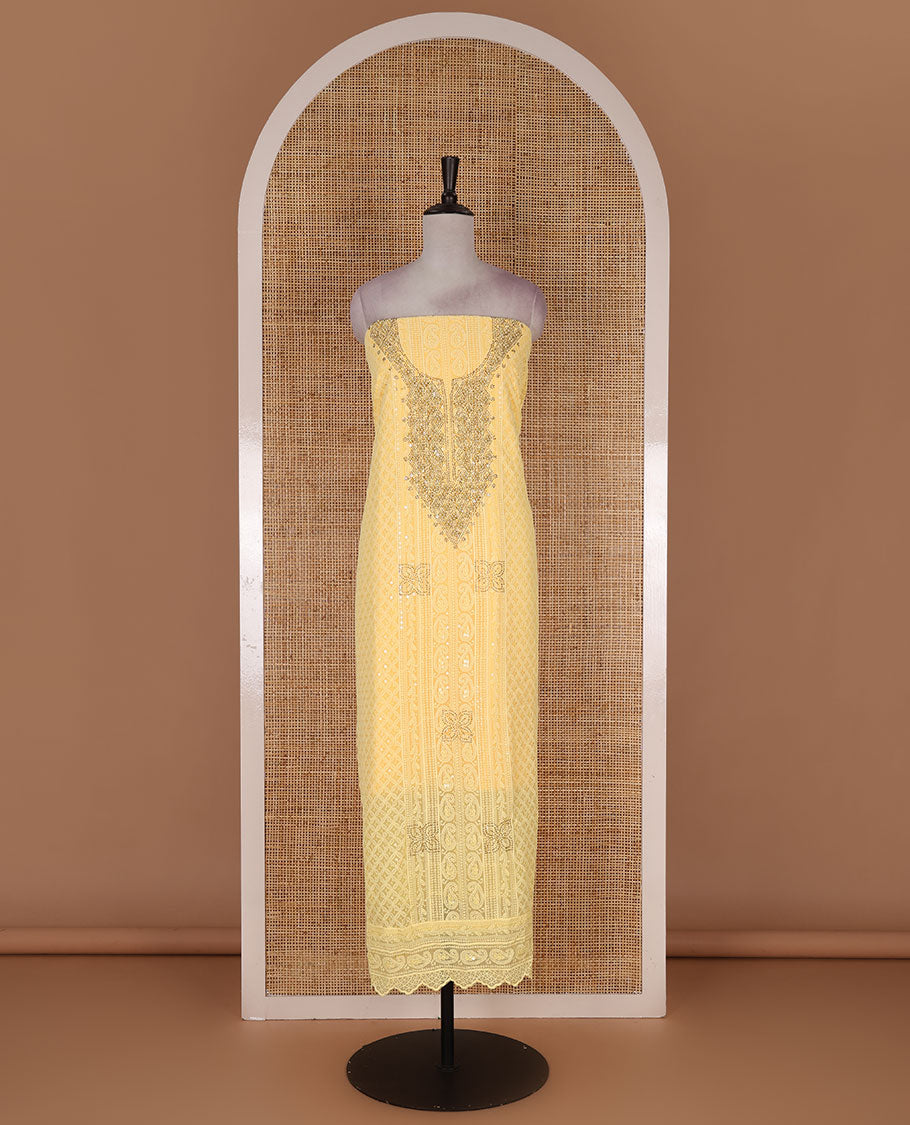 Yellow material churidar set, stone work with Schiffli style embroidered georgette top, American Crape bottom, and polka dotted printed mirror work dupatta